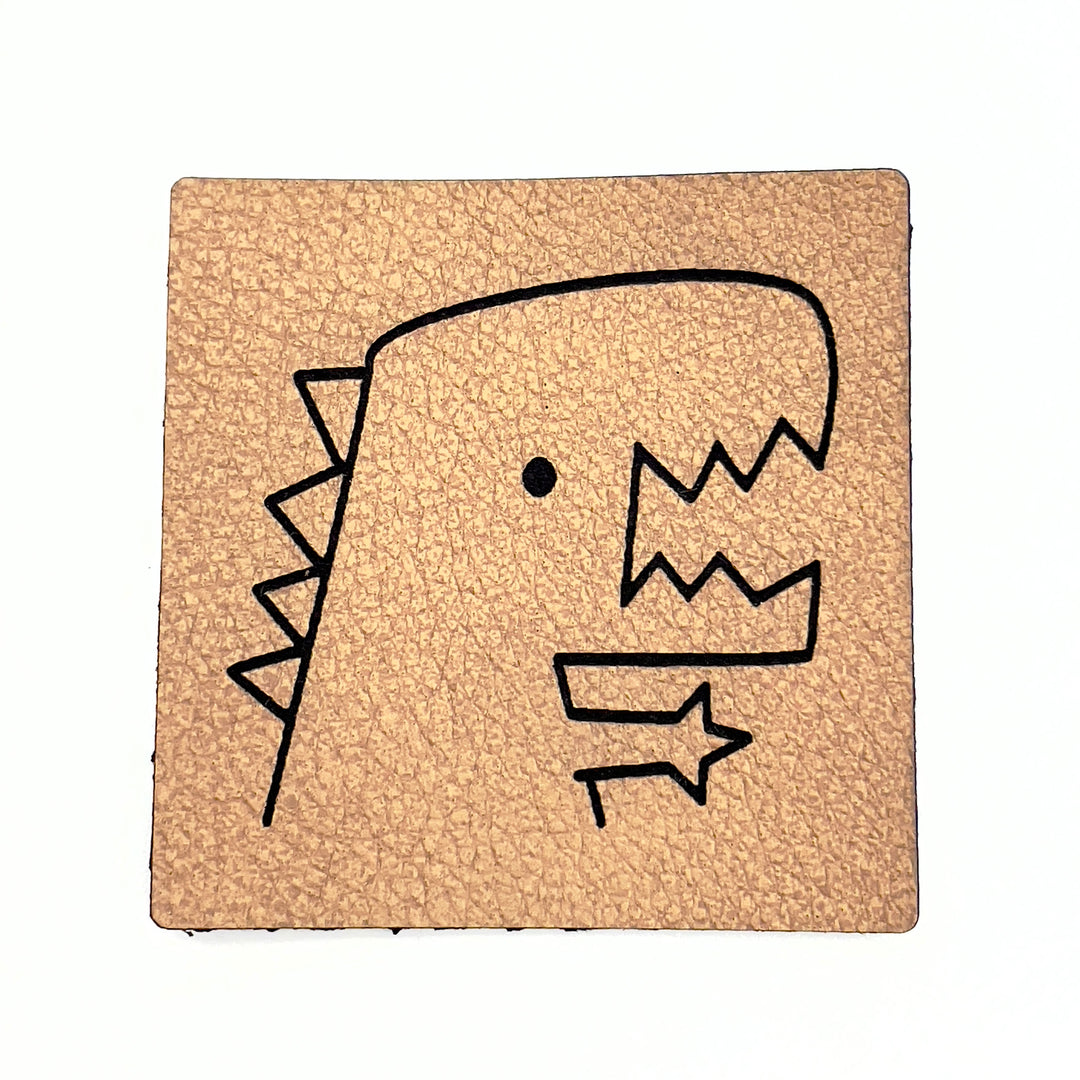 1 Kunstlederlabel "Dino" - Braun