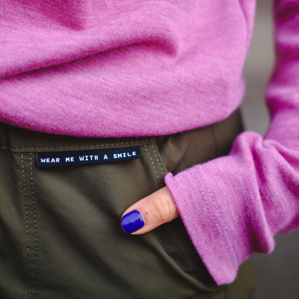 Weblabel "wear me with a smile"- schwarz