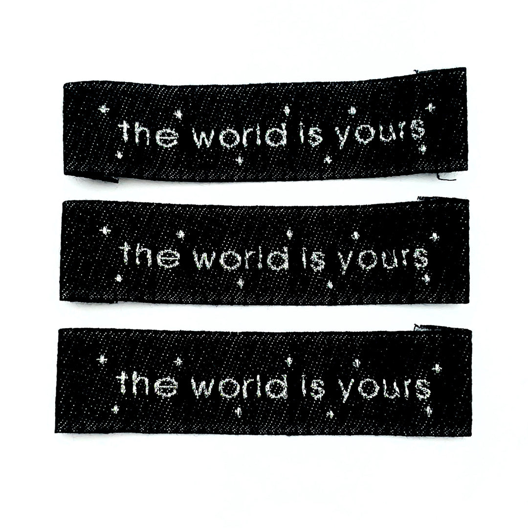 Weblabel aus Baumwolle „the world is yours“ - Schwarz Glitzer - 3 Stück