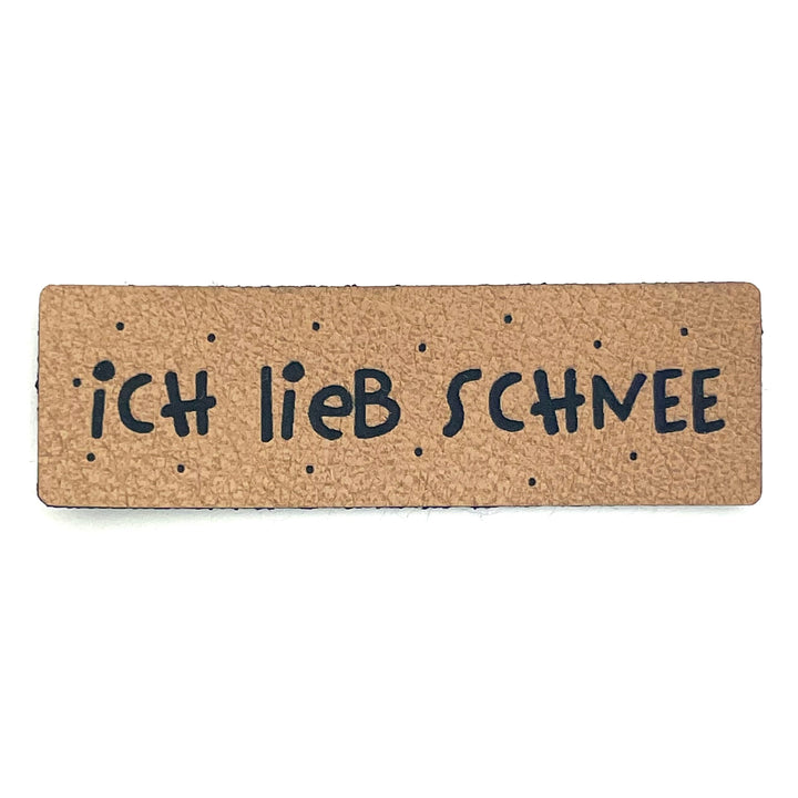 1 Kunstlederlabel "ich lieb Schnee" - Braun